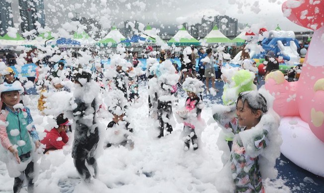 White snow falling in August